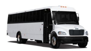 White passenger bus with tinted windows.